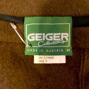 Beautiful boiled wool brown skirt with side zip. New condition, rarely worn.